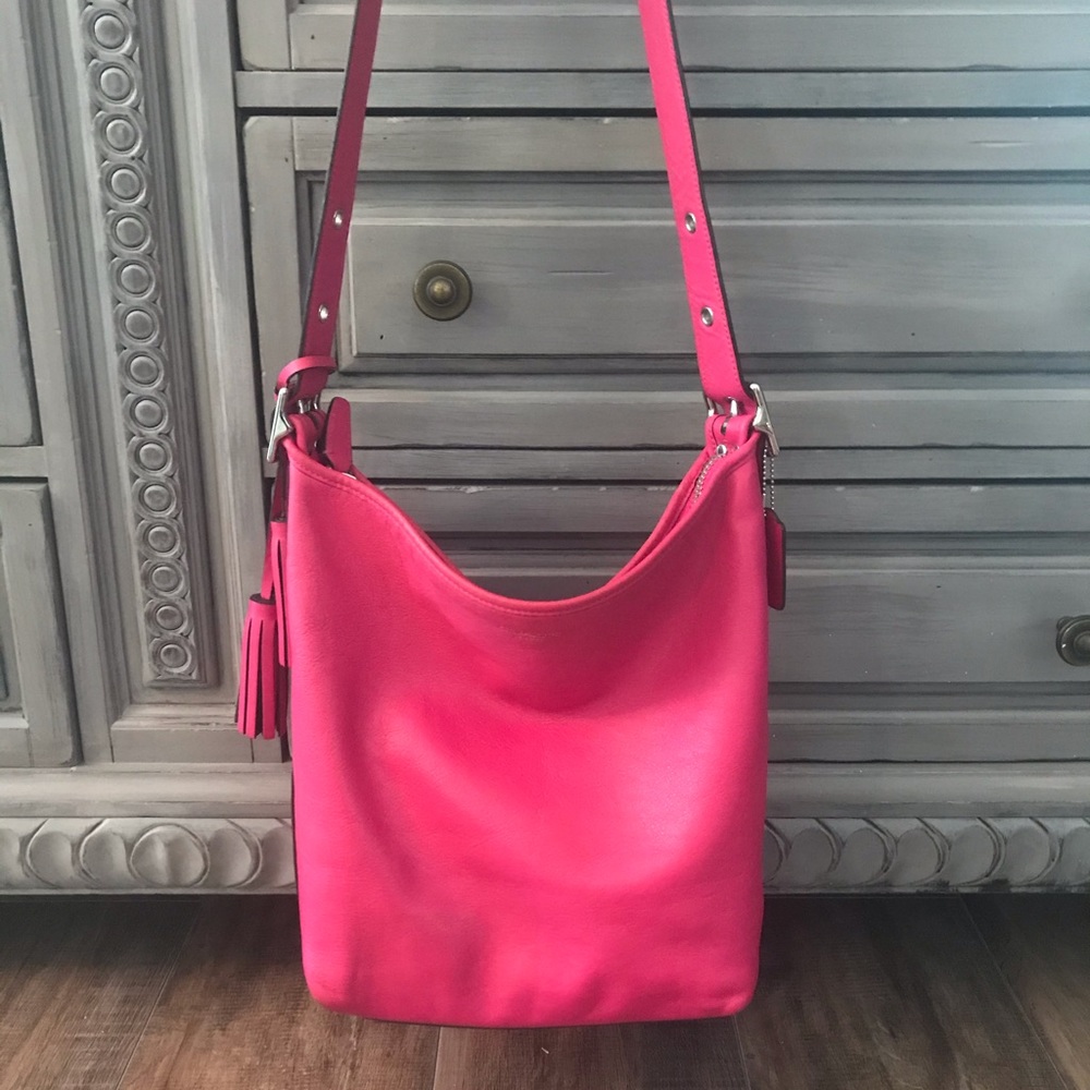 Coach legacy bucket bag with tassel